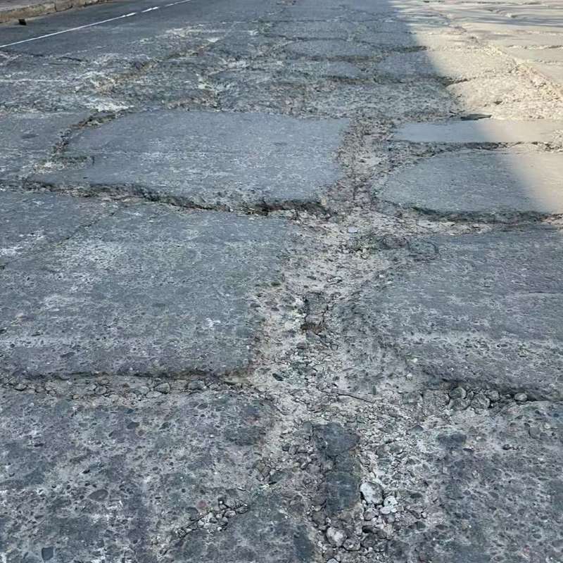 武胜路面起砂露石子修补料